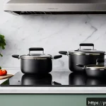 주방완구 가격대 비교 - A modern kitchen countertop featuring a set of stainless steel cookware with triple-layered bottoms,...